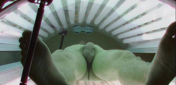  Young man secretly filmed in public solarium